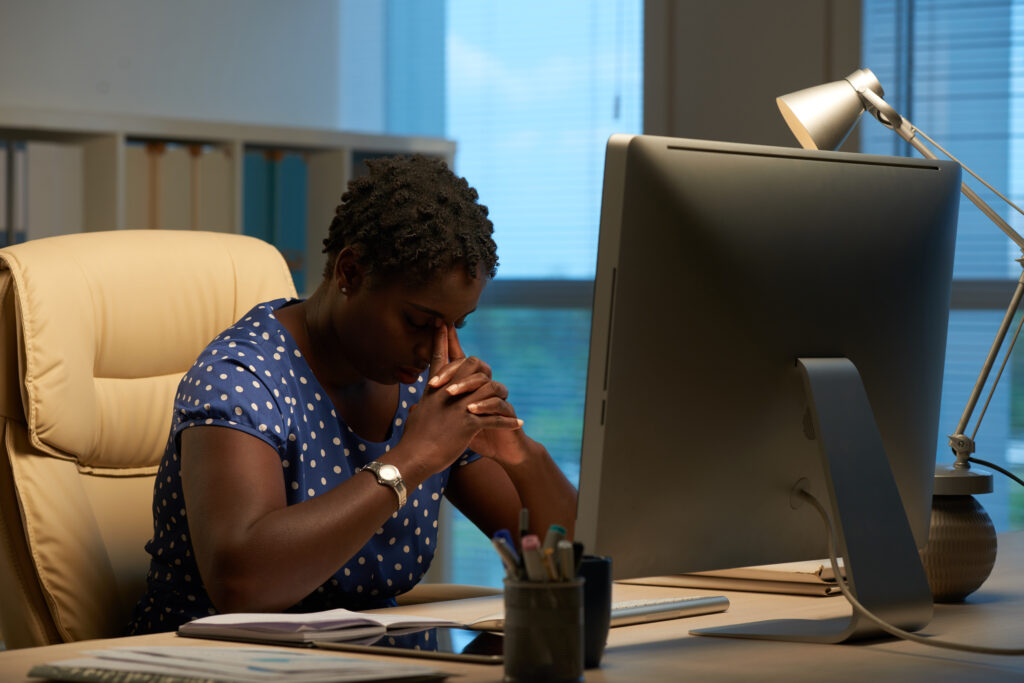 Pretty African-American female entrepreneur tired of work